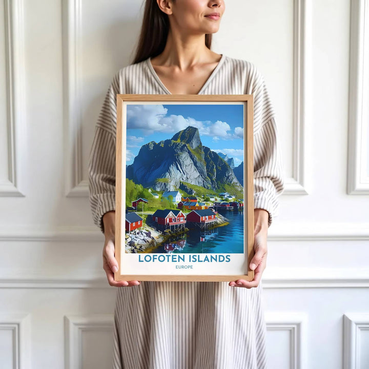 High detail landscape print depicting Hamnoy wooden cabins, fjord waters, and Mount Olstinden sheer cliff walls in Norway. Brought by MapYourDreams, this artwork is available in flexible options including unframed paper, custom wooden frames, and gallery canvas wraps for study room decor.
