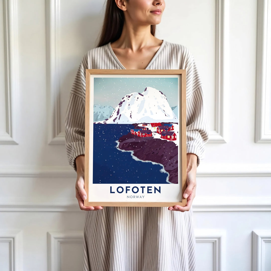 Bold graphic depiction of the iconic Lofoten scenery in Norway with a dramatic snow peak overlooking a cluster of red rorbuer cabins. Offered by MapYourDreams, this travel artwork is customizable as an unframed poster print, ready-to-display framed print, or premium gallery wrap canvas.