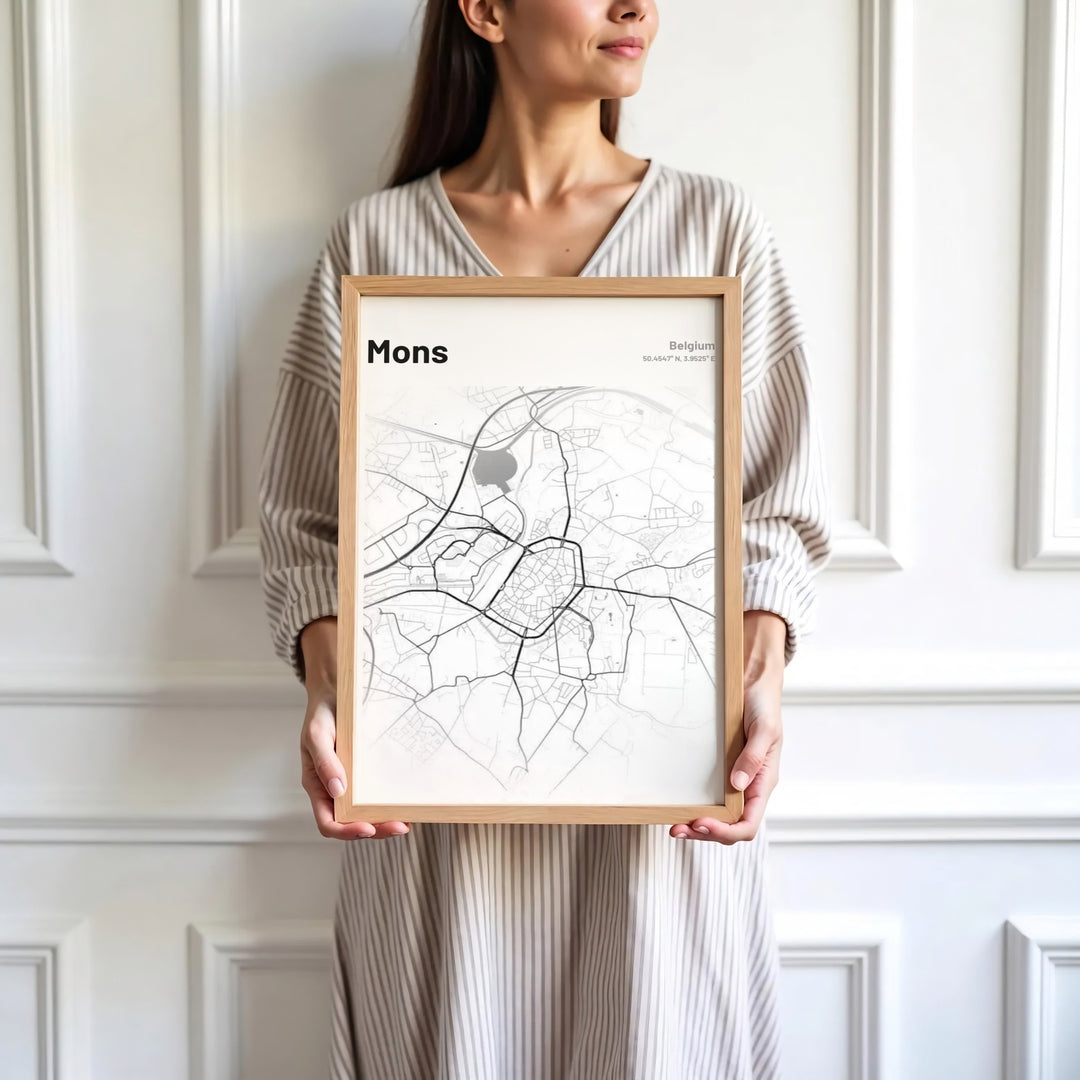 Crisp black and white street map design of Mons, Belgium, bringing modern elegance and geographic precision to your interior wall. Offered by MapYourDreams, this artwork is available in flexible options including unframed paper, custom wooden frames, and gallery canvas wraps.