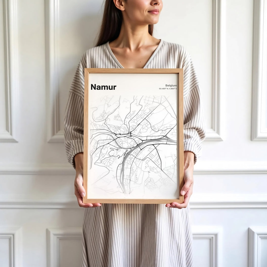 Crisp black and white street map design of Namur, Belgium, bringing modern sophistication and geographic layout to your wall decor. Offered by MapYourDreams, this artwork is available in flexible options including unframed paper, custom wooden frames, and gallery canvas wraps.