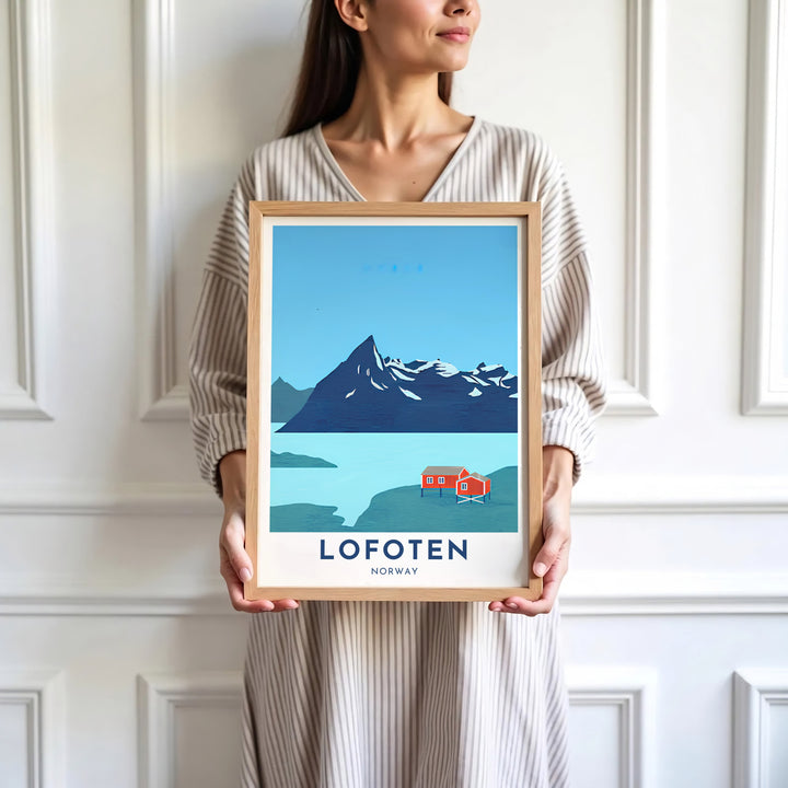 Clean poster of Lofoten in Norway with traditional red stilt houses beneath a majestic Arctic mountain peak. Offered by MapYourDreams, this travel artwork is customizable as an unframed poster print, ready-to-display framed print, or premium gallery wrap canvas.
