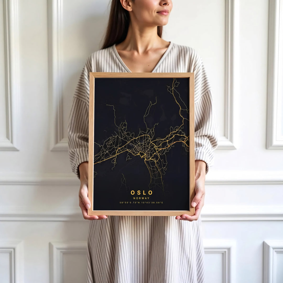 Luxury gold and black vector city print showing the complete urban street grid of Oslo Norway with centered coordinate details. Designed for home decor, select between lightweight unframed paper prints, solid wood display frames, or gallery wrapped canvas panels.