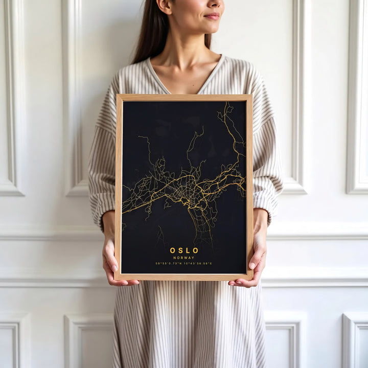 Luxury gold and black vector city print showing the complete urban street grid of Oslo Norway with centered coordinate details. Designed for home decor, select between lightweight unframed paper prints, solid wood display frames, or gallery wrapped canvas panels.