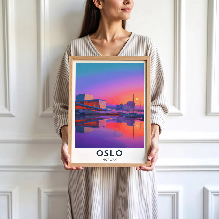 Atmospheric travel artwork displaying the Oslo Opera House with centered capital typography against a dramatic purple sunset harbor in Norway. Designed for home decor, select between lightweight unframed paper prints, solid wood display frames, or gallery wrapped canvas panels.