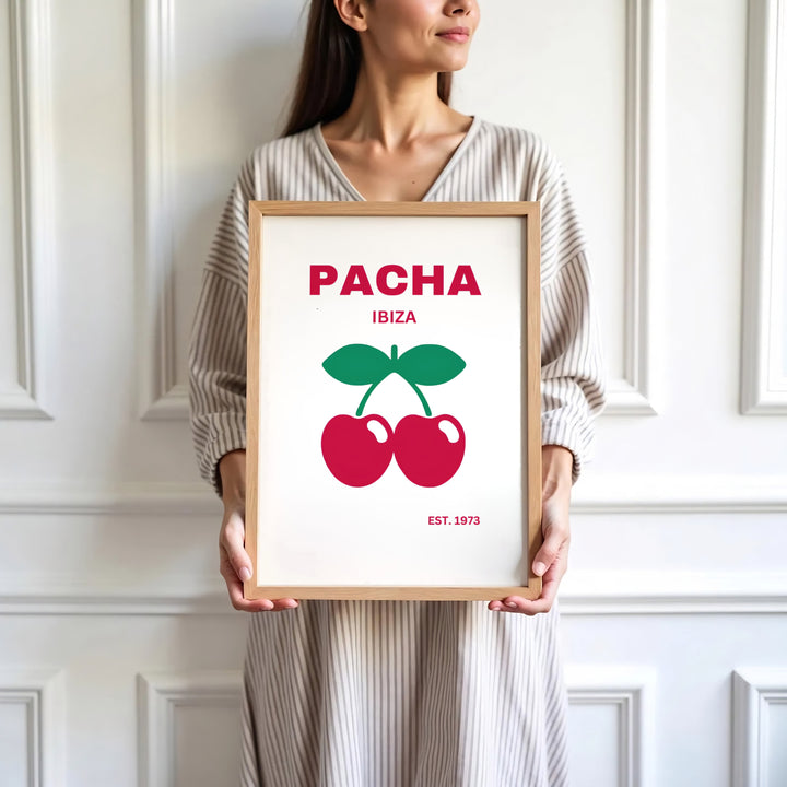 Historic clubbing logo art print featuring red cherries with green leaves for Pacha in Ibiza, Spain, presented by MapYourDreams where users can select unframed paper posters, ready-to-hang canvas decor, or custom framed wall art choices.