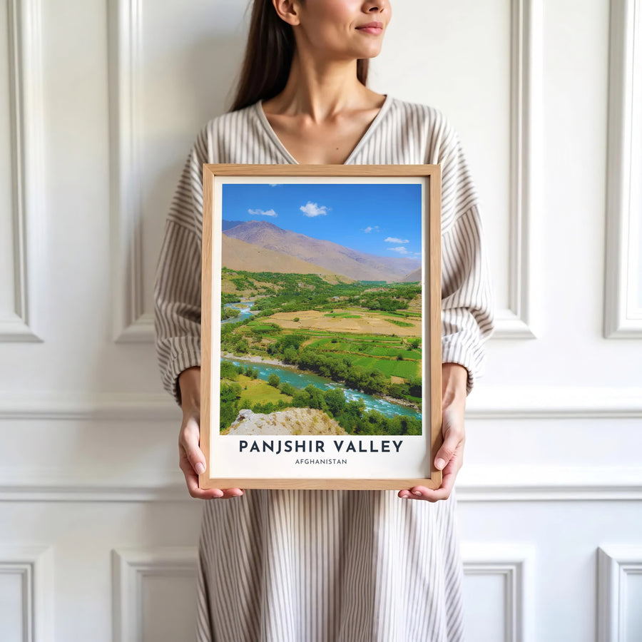 Travel destination photography poster depicting Panjshir Valley, Afghanistan, framed by steep mountain slopes and brilliant blue sky. Presented by MapYourDreams as an unframed paper print, a gallery canvas, or a custom framed decor piece in black, natural wood, and white frames for creative studio spaces.