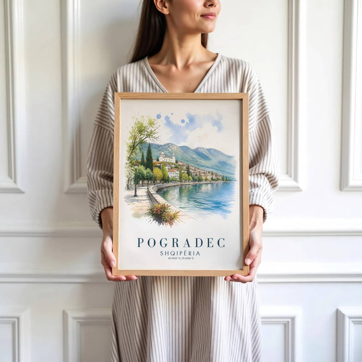 Vibrant green shade trees and charming lakefront architecture define the resort tourist center of Pogradec in southeastern Albania. MapYourDreams produces this image in unframed paper, custom wooden frames, and stretched canvas options.