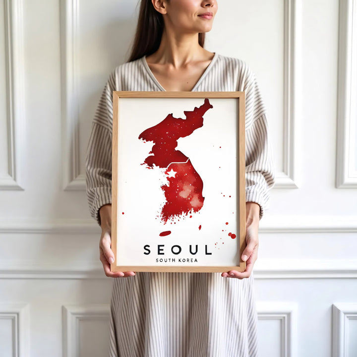 Sleek red watercolor peninsula poster capturing the artistic spirit of Seoul, South Korea, available at MapYourDreams with varied choices including unframed art prints, custom frames, and wrapped canvas designed to elevate any modern interior setting.