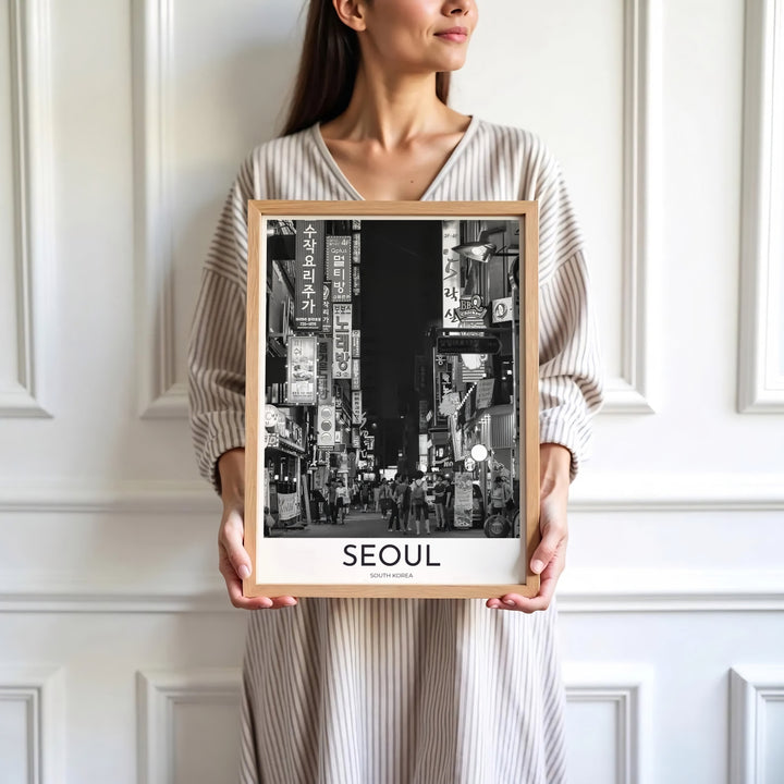 Sleek monochrome city street poster capturing the authentic night energy of Seoul South Korea, available at MapYourDreams with varied choices including unframed art prints, custom frames, and wrapped canvas designed to elevate any modern interior setting.