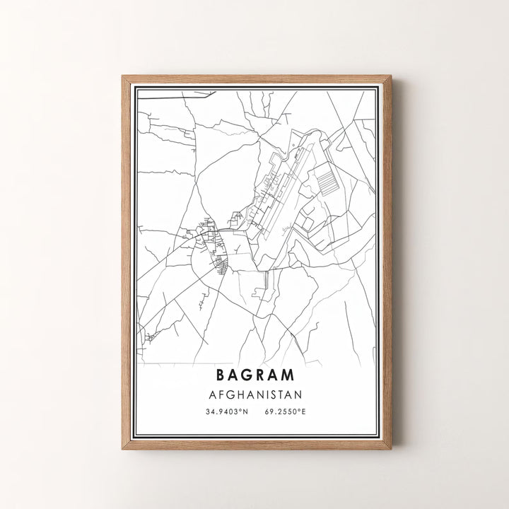 Geographic line cartography print of Bagram Afghanistan showcasing road networks and precise coordinates in black ink, offered by MapYourDreams as an unframed art print, gallery canvas print, or custom framed wall art in retro white and silver frame choices.