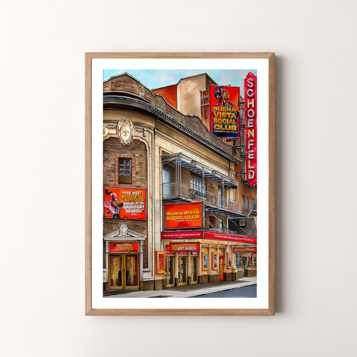Bold Manhattan landmark art piece detailing the red vertical sign, intricate brick masonry, and marquee displays at the Gerald Schoenfeld Theatre, available at MapYourDreams as an unframed print, a stretched canvas, or custom framing options to complement statement gallery wall setups.