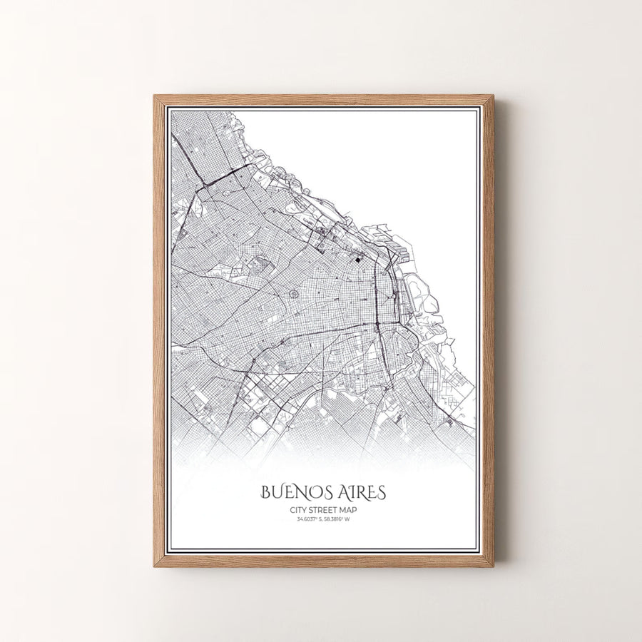 Modern minimalist travel poster displaying a black and white street map of Buenos Aires with geographic coordinate lettering. Available in the MapYourDreams studio, this geographic print is offered as unframed archival paper, framed wall art, or gallery canvas wraps.