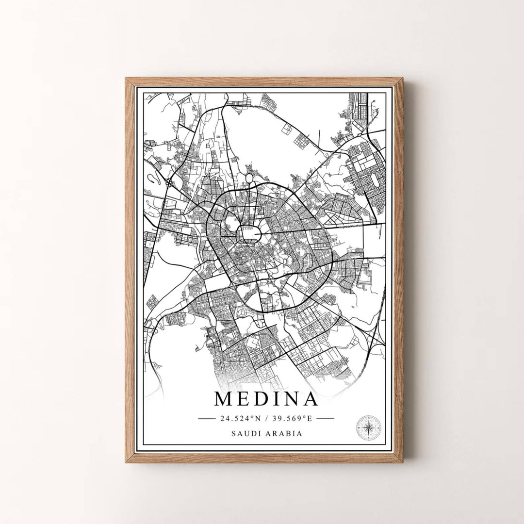 Radiant black and white wall art map print of Medina Saudi Arabia with modern minimalist layout and high contrast line work. Presented by MapYourDreams, this artwork is available in flexible options including unframed paper, custom wooden frames, and gallery canvas wraps for timeless wall decor.