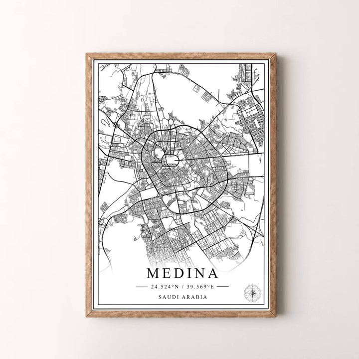 Radiant black and white wall art map print of Medina Saudi Arabia with modern minimalist layout and high contrast line work. Presented by MapYourDreams, this artwork is available in flexible options including unframed paper, custom wooden frames, and gallery canvas wraps for timeless wall decor.