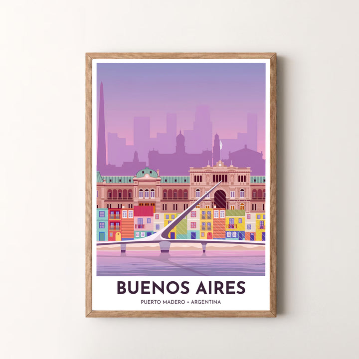 Combining bold poster typography with whimsical graphic illustration, this Puerto Madero wall decor brings Argentine romance and color to life, created by MapYourDreams and provided in unframed paper, custom wooden frames, and gallery canvas options.