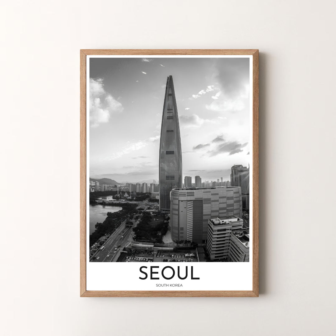 Premium black and white architectural print displaying the iconic Lotte World Tower above Seoul streets, designed by MapYourDreams in flexible configurations including unframed archival paper, metal frames, and canvas that deliver refined craftsmanship and striking visual beauty.