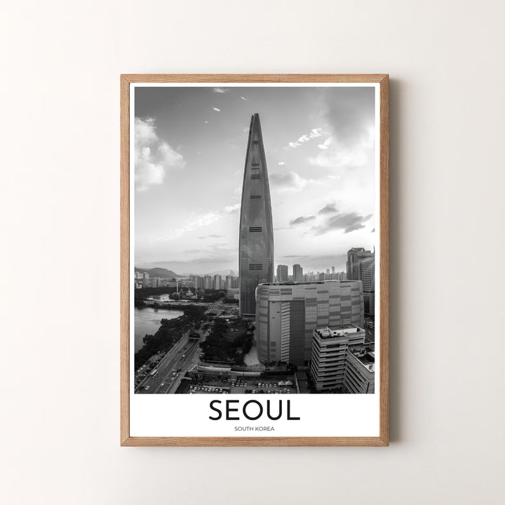 Premium black and white architectural print displaying the iconic Lotte World Tower above Seoul streets, designed by MapYourDreams in flexible configurations including unframed archival paper, metal frames, and canvas that deliver refined craftsmanship and striking visual beauty.