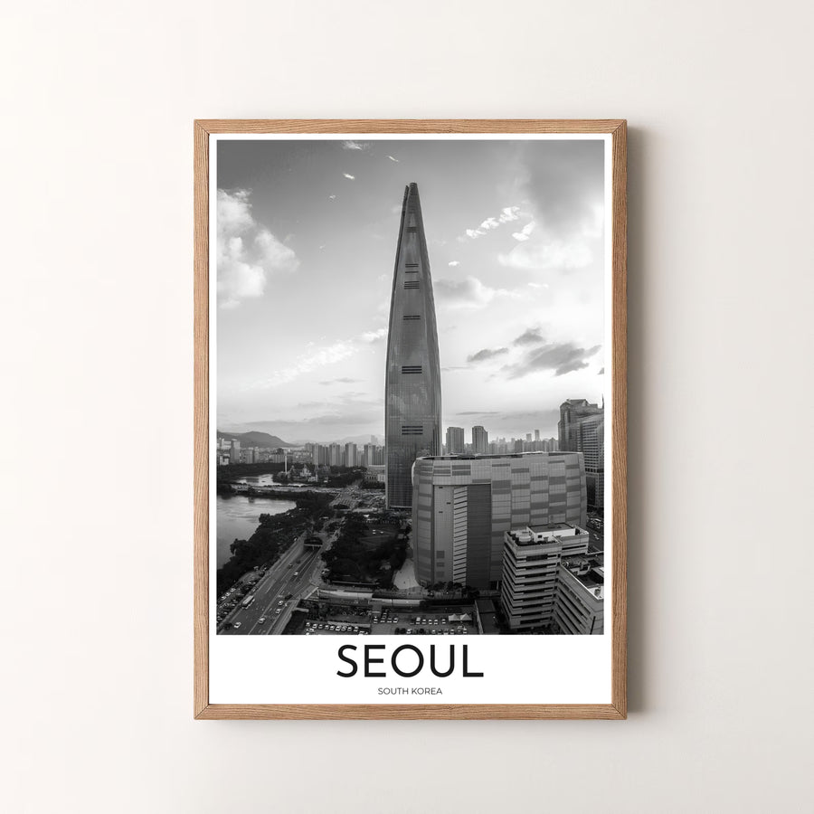 Premium black and white architectural print displaying the iconic Lotte World Tower above Seoul streets, designed by MapYourDreams in flexible configurations including unframed archival paper, metal frames, and canvas that deliver refined craftsmanship and striking visual beauty.