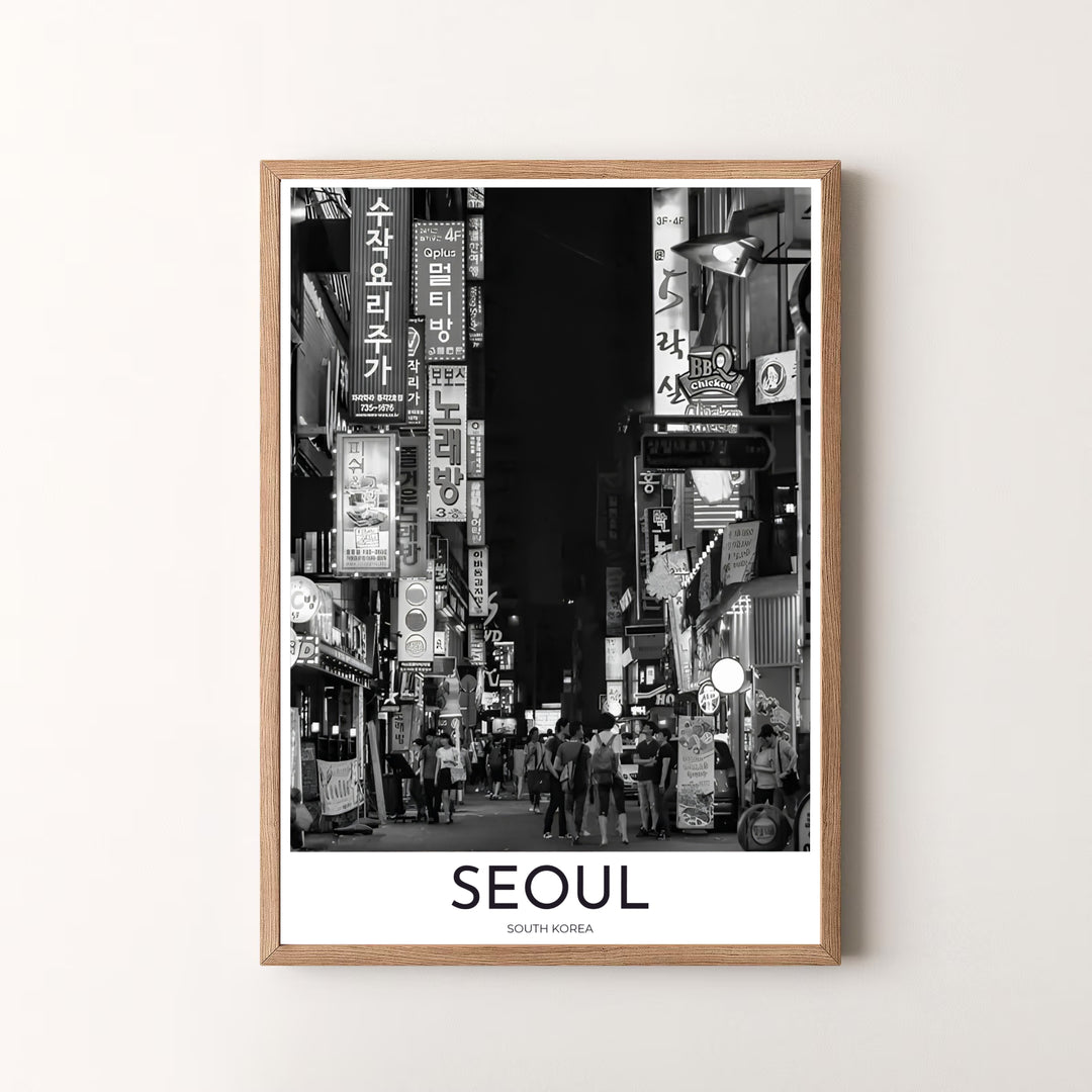 Premium black and white street photography print displaying a crowded night alley with glowing Hangul signs in Seoul South Korea, designed by MapYourDreams in flexible configurations including unframed archival paper, metal frames, and canvas that deliver striking visual style.