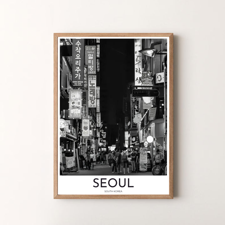 Premium black and white street photography print displaying a crowded night alley with glowing Hangul signs in Seoul South Korea, designed by MapYourDreams in flexible configurations including unframed archival paper, metal frames, and canvas that deliver striking visual style.
