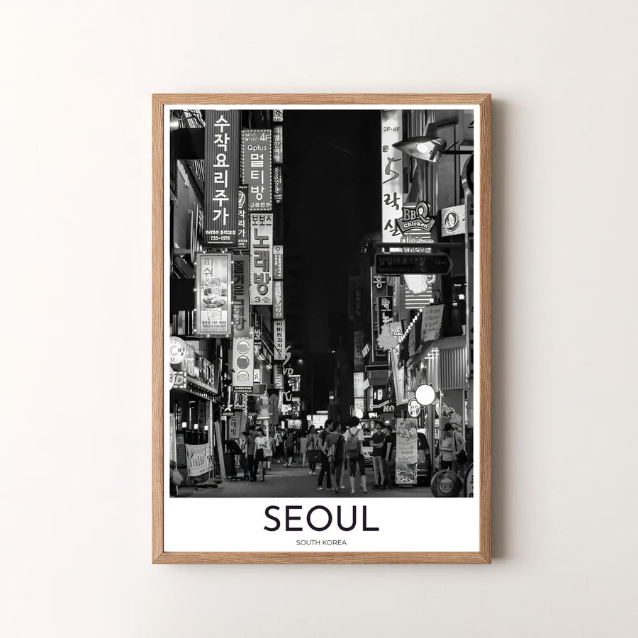 Premium black and white street photography print displaying a crowded night alley with glowing Hangul signs in Seoul South Korea, designed by MapYourDreams in flexible configurations including unframed archival paper, metal frames, and canvas that deliver striking visual style.